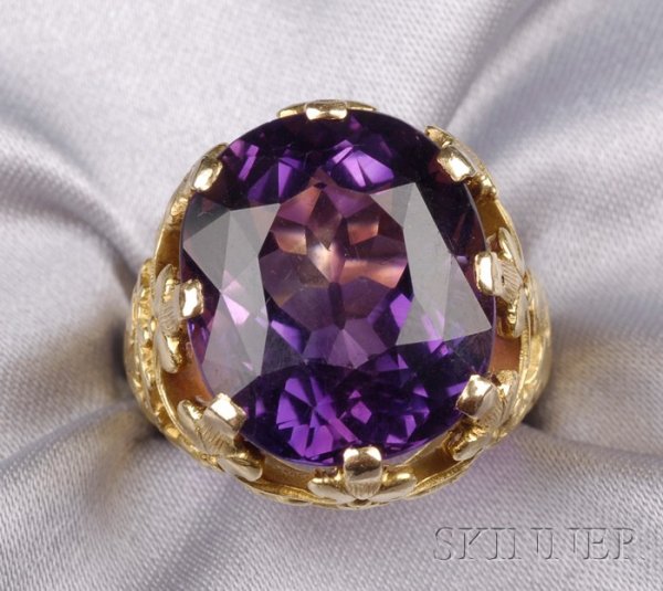 Renaissance Revival 18kt Gold and Amethyst Bishop: Renaissance Revival 18kt Gold and Amethyst Bishop's Ring, Tiffany & Co., centering an oval amethyst measuring approx. 18.00 x 15.35 x 10.75 mm, shoulders with relief images of St. Mark's lion and bish