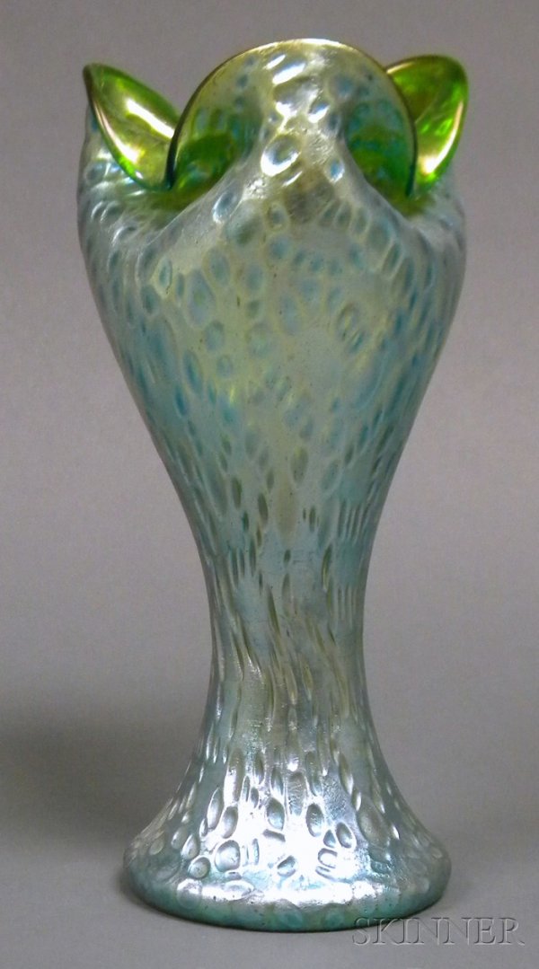 Vase, Possibly Loetz Iridescent art glass Bohemia,: Vase, Possibly Loetz Iridescent art glass Bohemia, 20th century Tri-fold rim on blue iridescence on green glass, waisted form with dimpled surface, polished pontil, ht. 12 in.