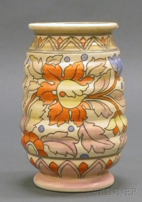 Charlotte Rhead for Crown Ducal Vase Decorated ear: Charlotte Rhead for Crown Ducal Vase Decorated earthenware England, c. 1935 Wide mouth on undulating cylindrical form decorated with cream and orange flowers with blue and blush-colored accents, marke