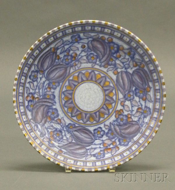 Charlotte Rhead Pottery Charger Decorated earthenw: Charlotte Rhead Pottery Charger Decorated earthenware England, c. 1935 Circular form decorated with blue closed-petal flowers with gilt accents, center floral medallion, marked Rhead F, Crown Ducal bl
