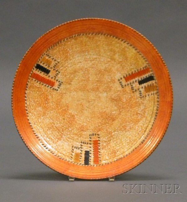 Crown Ducal Charger Decorated earthenware England,: Crown Ducal Charger Decorated earthenware England, second quarter 20th century Circular form with abstract decoration in orange, black, and rust on a mottled orange ground, Crown Ducal Made in England