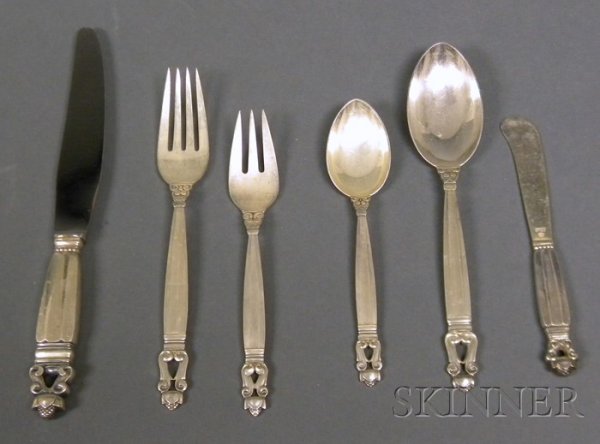 Georg Jensen Acorn Flatware Sterling silver Design: Georg Jensen Acorn Flatware Sterling silver Design by Johan Rhode in 1915, Denmark Twelve dinner knives, eleven butter knives, ten teaspoons, eight tablespoons, twelve desert forks, and eight dinner f