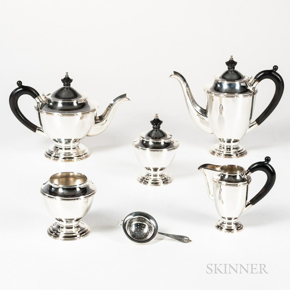 Wallace Silversmiths Five-piece Sterling Silver Coffee: Wallace Silversmiths Five-piece Sterling Silver Coffee and Tea Service, Wallingford, Connecticut, after 1871, wooden urn finials and loop handles, reeded border with crosses at bases and tops of bodie