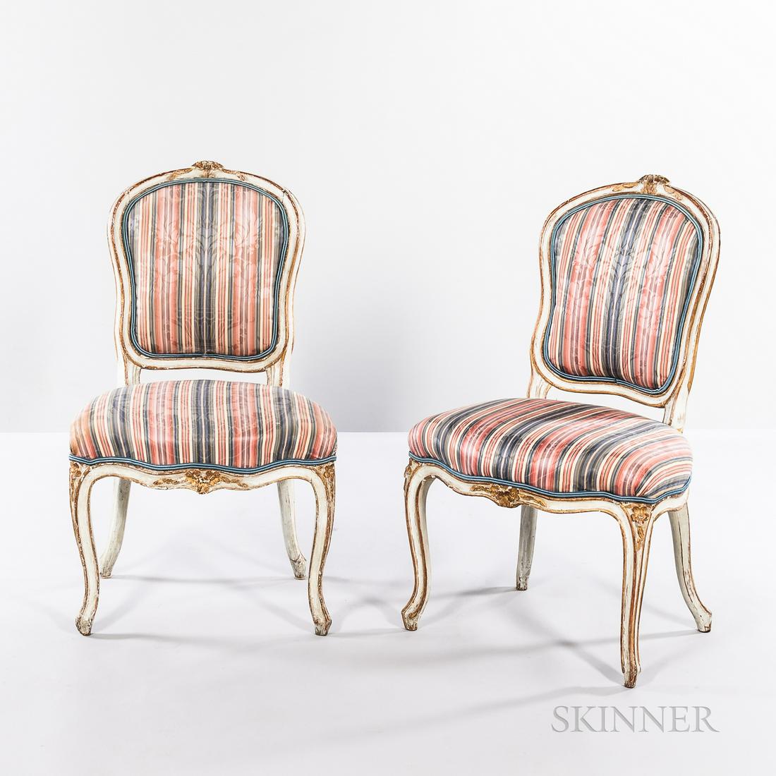 Set of Twelve Louis XV Parcel-gilt, White, and: Set of Twelve Louis XV Parcel-gilt, White, and Gray-painted Chaises en Cabriolet, France, mid-18th century, striped upholstery, ht. 34 1/4, wd. 21, dp. 20 in.
