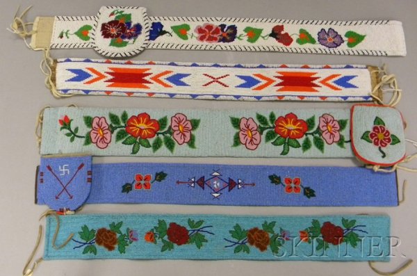 Five Child's Beaded Belts, three with pouches. Prov: Five Child's Beaded Belts, three with pouches. Provenance: Historic Lammers Trading Post, established 1917 in Hardin, Montana.