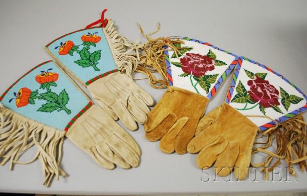 Two Pairs of Native American Floral Beaded Gauntlet: Two Pairs of Native American Floral Beaded Gauntlets. Provenance: Historic Lammers Trading Post, established 1917 in Hardin, Montana.
