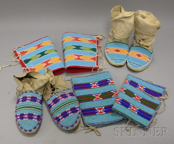 Two Sets of Matched Moccasins and Leggings. Provena: Two Sets of Matched Moccasins and Leggings. Provenance: Historic Lammers Trading Post, established 1917 in Hardin, Montana.