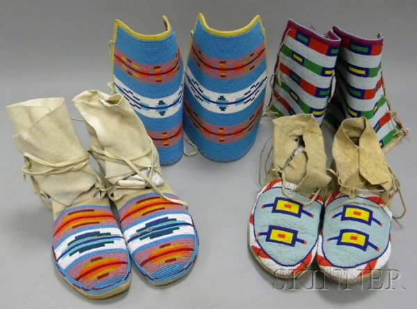 Two Sets of Beaded Crow Moccasins with Leggings. Pr: Two Sets of Beaded Crow Moccasins with Leggings. Provenance: Historic Lammers Trading Post, established 1917 in Hardin, Montana.