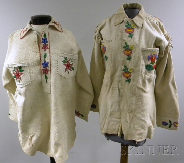 Two Plains Beaded Hide Shirts, floral decoration. P: Two Plains Beaded Hide Shirts, floral decoration. Provenance: Historic Lammers Trading Post, established 1917 in Hardin, Montana.