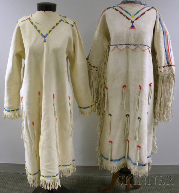 Two Women's Beaded Hide Dresses, geometric designs.: Two Women's Beaded Hide Dresses, geometric designs. Provenance: Historic Lammers Trading Post, established 1917 in Hardin, Montana.