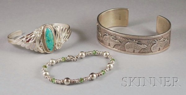 Three Silver Bracelets, a half cuff signed R.M.T.,: Three Silver Bracelets, a half cuff signed R.M.T., a half cuff with inset turquoise stone, and one composed of beads and crystal.