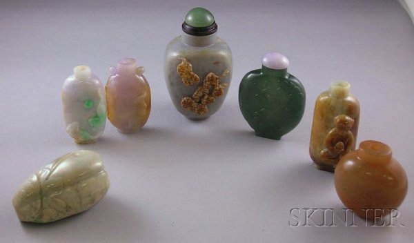 Seven Asian Carved Stone Snuff Bottles, including : Seven Asian Carved Stone Snuff Bottles, including green jade, white and brown bottle with carved bats, a brown carved monkey, a carved fruit/vegetable, and white and brown with carved mice, etc.