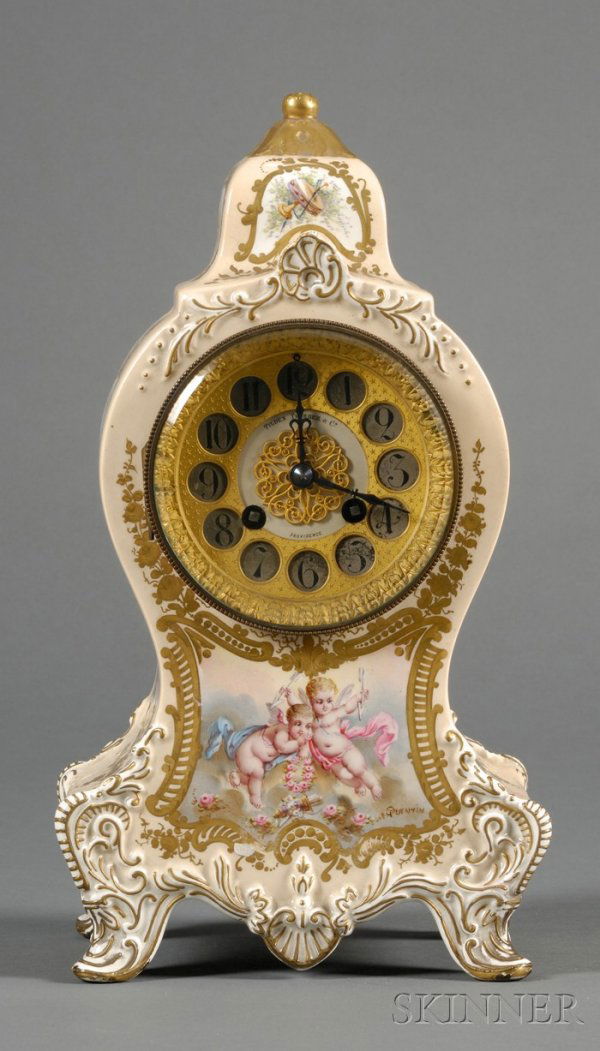 Longwy Earthenware Mantel Clock, France, late 19th c: Longwy Earthenware Mantel Clock, France, late 19th century, retailed by Tilden Thurber and Co. of Providence, Rhode Island, buff-colored ground with gilt-framed polychrome enameled cartouches, cherubs