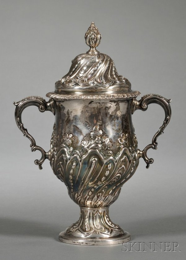 George III Silver Cup, London, 1775, Charles Wrigh: George III Silver Cup, London, 1775, Charles Wright, maker, ovoid, with beaded serpentine handles, on trumpet foot, chased and embossed with diagonal beaded and reeded flutes, and accented with leaves