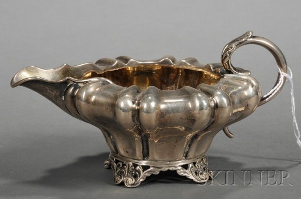 William IV Silver Creamer, London, 1833, maker's m: William IV Silver Creamer, London, 1833, maker's mark CP, squat melon-shaped, with vertical lobing, short spout, on four openwork shell feet, ht. 3 3/8 in., approx. 8 troy oz.