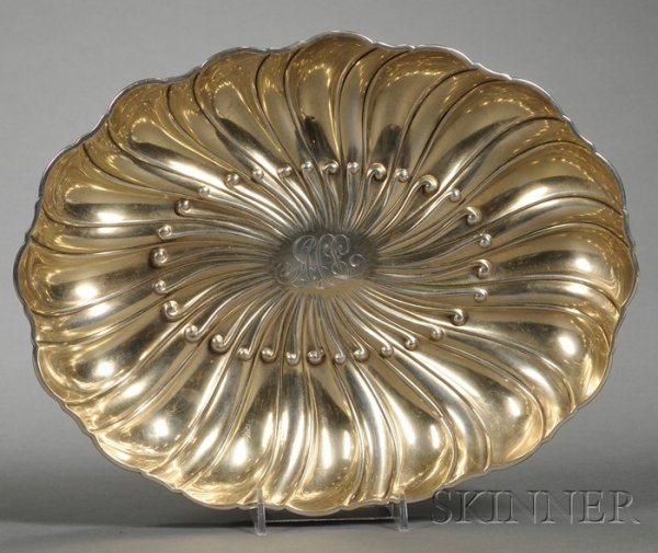 Gorham Sterling Parcel-gilt Open Serving Bowl, 189: Gorham Sterling Parcel-gilt Open Serving Bowl, 1892, oval, with curved ogee lobing, center with a stylized chrysanthemum design, interior gold-washed, monogrammed, lg. 11 in., approx. 13 troy oz.