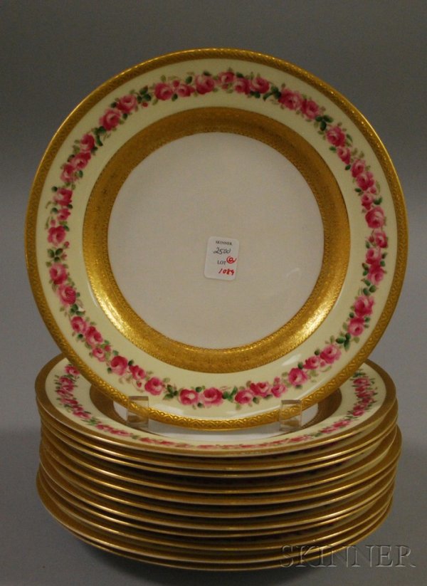 Set of Twelve Royal Worcester Gilt and Hand-paint: Set of Twelve Royal Worcester Gilt and Hand-painted Rose Decorated Porcelain Plates, dia. 9 in.