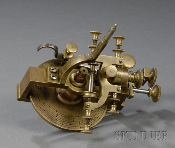 Small Brass and Steel Wheel Cutting Engine, Switzer: Small Brass and Steel Wheel Cutting Engine, Switzerland, second half 19th century, the vice-held and bow-powered tool for cutting crown wheels, 3 1/2 in. indexing plate with eight rows for cutting 7, 