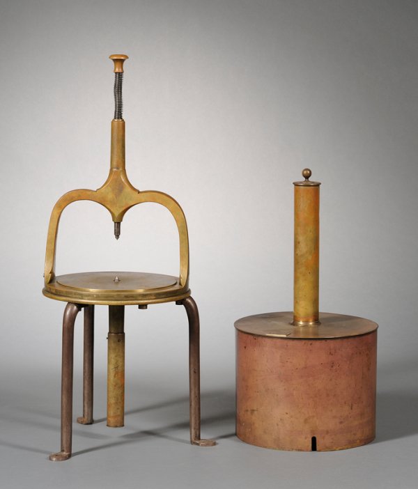 Brass Clock Uprighting Tool, Swiss, late 19th Cent: Brass Clock Uprighting Tool, Swiss, late 19th Century, the 9 1/2 in. round bed and cyma-shaped frame support the spring loaded steel runner and center point all on three sturdy iron legs for bench att