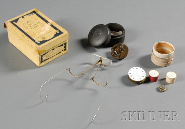 "Beebe Binocular Loupe" Magnifying Glasses, Americ: "Beebe Binocular Loupe" Magnifying Glasses, American Optical Company, c. 1900, with original box, together with two incomplete watch movements and related parts, (glasses box worn), box ht. 2 3/4, wd.