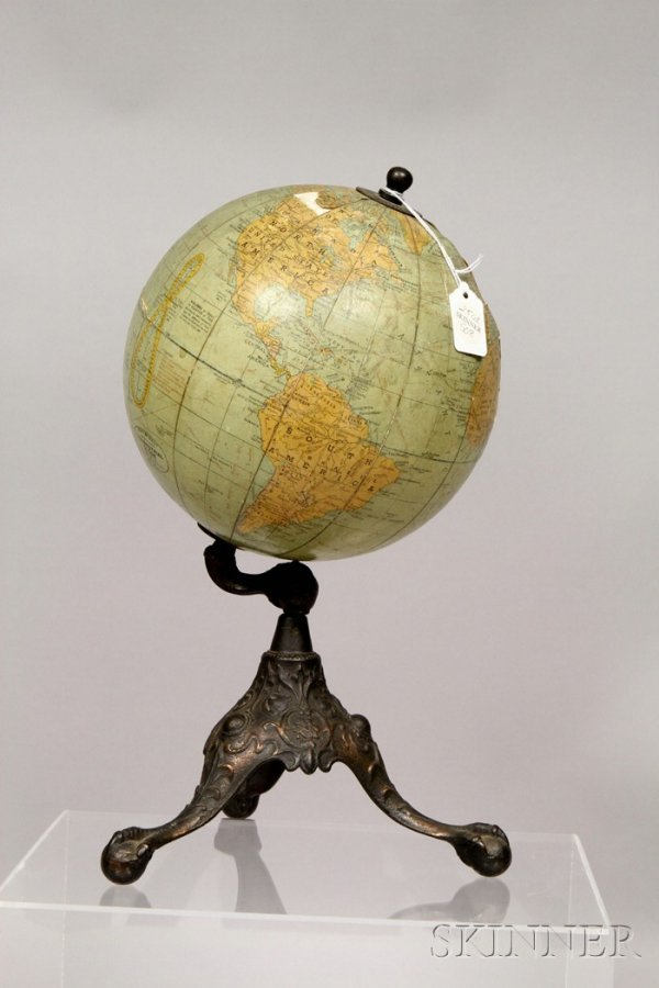 Rand McNally 8-inch Terrestrial Globe, twelve prin: Rand McNally 8-inch Terrestrial Globe, twelve printed gores on card and plaster sphere, maker's cartouche, analemma for equation of time calculations, brass hour circles at the poles and tri-foot cast