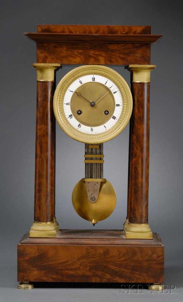 Mahogany Portico Table Clock by Ferey, Havre, Fran: Mahogany Portico Table Clock by Ferey, Havre, France, circa 1820, with 6 in. dia. engine-turned and fire gilt bezel and center, enameled chapter ring with Roman numerals and marked Ferey Au Havre, Bre