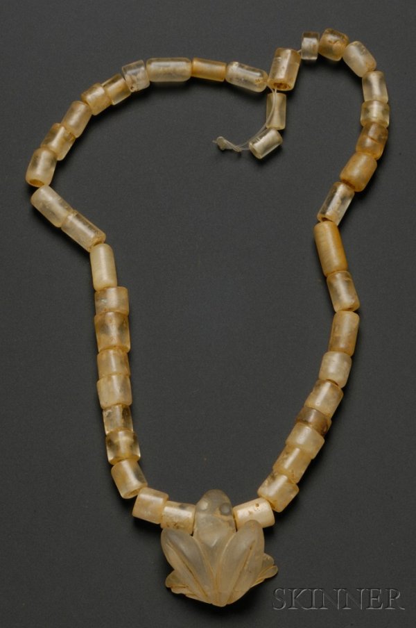 Pre-Columbian Quartz Necklace, Colombia, Sinu, c. : Pre-Columbian Quartz Necklace, Colombia, Sinu, c. 300-1550 A.D., various size tubular beads and stylized frog pendant, frog ht. 1 3/4 in.