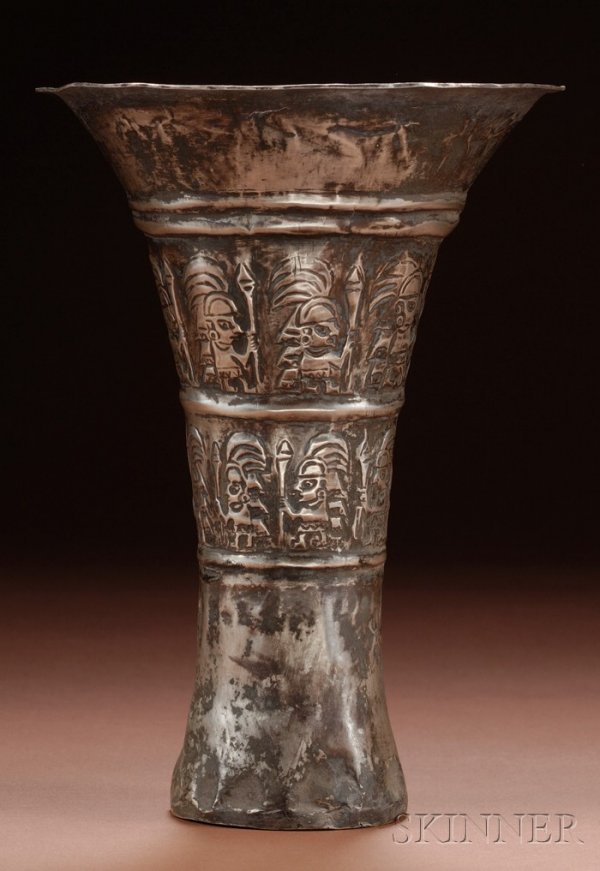 Pre-Columbian Embossed Silver Beaker, Peru, Lambay: Pre-Columbian Embossed Silver Beaker, Peru, Lambayeque, c. 1100-1400 A.D., with flared rim, rattle bottom, and decorated with two bands of warrior figures with elaborate headdresses and carrying large