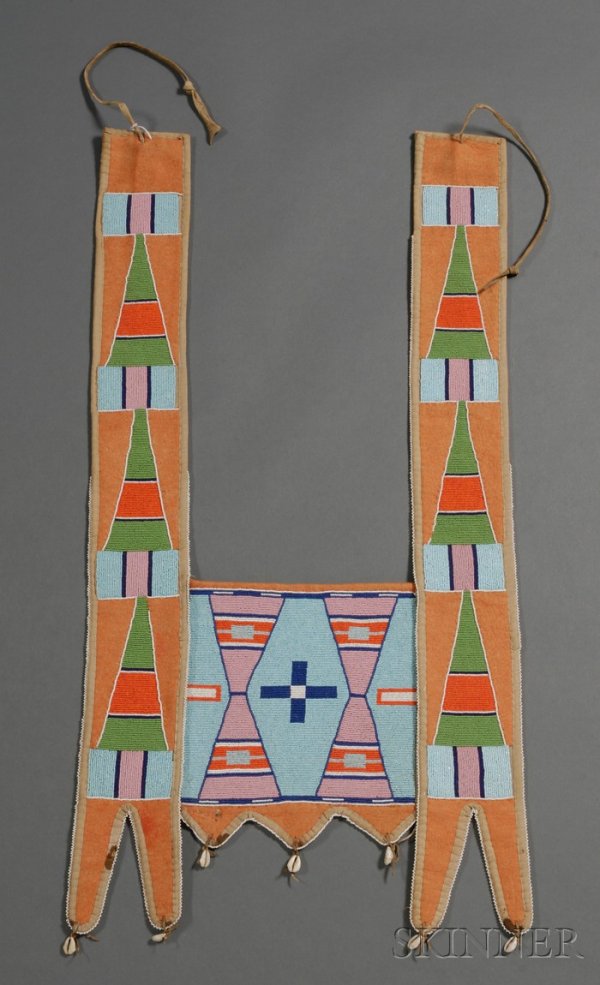 Plains Beaded Cloth Horse Collar, Crow, c. first q: Plains Beaded Cloth Horse Collar, Crow, c. first quarter 20th century, felt over canvas and beaded with classic Crow designs, cowry shell dangles, lg. 34 1/2 in.