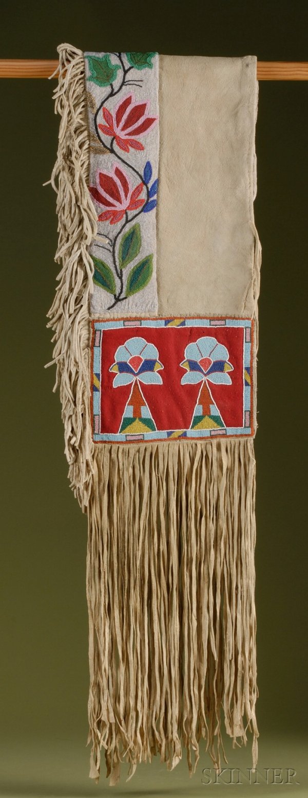 Northern Plains Beaded Hide and Cloth Double Saddl: Northern Plains Beaded Hide and Cloth Double Saddlebags, Crow, c. early 20th century, hide with long fringe and fringe up one side, partially lined with flour sacking, the beaded panels with multicolo