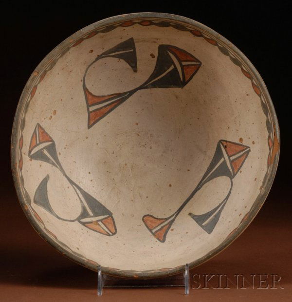 Southwest Painted Pottery Dough Bowl, c. early 20t: Southwest Painted Pottery Dough Bowl, c. early 20th century, San Ildefonso, painted with two-color abstract designs on a cream colored slip, (chip at rim), ht. 4 3/4, dia. 11 1/4 in.