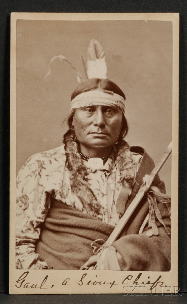 Carte de Visite of Sioux Chief Gaul, Gilbert and M: Carte de Visite of Sioux Chief Gaul, Gilbert and Miller, Mandan, Dakota, wearing headband and carrying a pipe and pipebag. Provenance: Estate of Ed McAndrews.