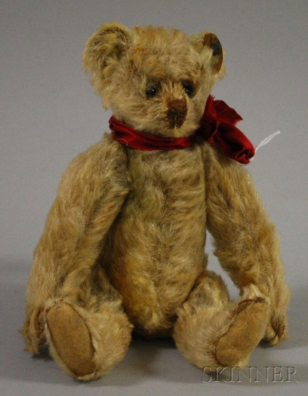 Steiff Teddy Bear, Germany, c. 1910, beige mohair: Steiff Teddy Bear, Germany, c. 1910, beige mohair with shoe button eyes, stitched nose, mouth, and claws, felt pads, excelsior stuffed, original underscored "f" button, ht. 8 1/2 in.
