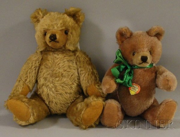 Two Steiff Reproduction "Original" Teddy Bears, 19: Two Steiff Reproduction "Original" Teddy Bears, 1980s, fully jointed, plastic eyes, synthetic plush pads, one has tan plush fur and paper chest tag, ht. 13 in., the other with long gold mohair fur, ht