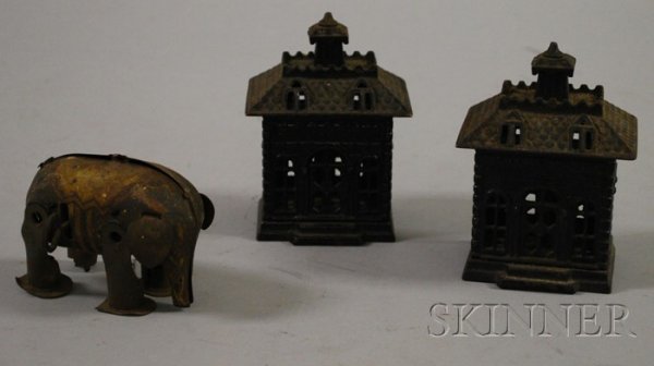 Three Small Toys, a wind-up elephant lithographed : Three Small Toys, a wind-up elephant lithographed toy, and a pair of cast iron "State Street" still banks, ht. of banks 4 1/2 in.