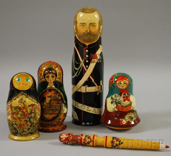 Five Modern Russian Lacquered Doll Items, two nest: Five Modern Russian Lacquered Doll Items, two nesting dolls, a bottle holder, a nesting doll pencil, and one bell-shaped jingling doll, ht. to 12 1/2 in.