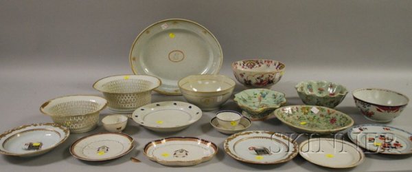 Nineteen Pieces of Assorted Export Porcelain Tabl: Nineteen Pieces of Assorted Export Porcelain Tableware, a platter, two reticulated fruit baskets, three bowls, a warming dish, three plates, two cups and a saucer, an armorial plate, soup bowl, and sh