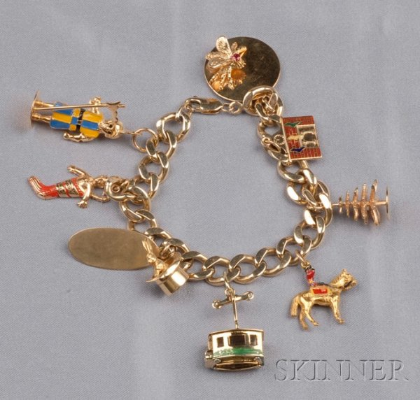 14kt Gold and Enamel Charm Bracelet, the flattened: 14kt Gold and Enamel Charm Bracelet, the flattened curb chain suspending nine charms including a Swiss guardsman, a fireplace hung with stockings, a gondola car, a Canadian Mountie, a stuffed Christma
