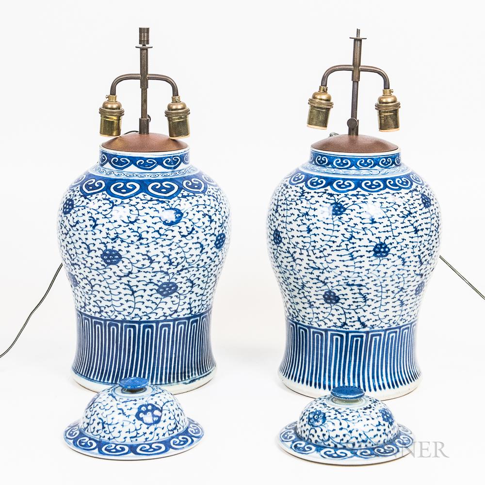 Two Pairs of Covered Jars Mounted as Lamps: Two Pairs of Covered Jars Mounted as Lamps, China, a pair of blue and white ginger jars decorated with foliate scroll design; and a pair of enameled covered ginger jars decorated with lotus and callig