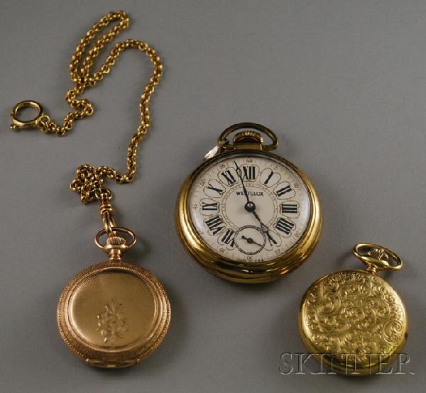 Three Pocket Watches and a Watch Chain, watches by: Three Pocket Watches and a Watch Chain, watches by Westclox, Elgin, and La Marque.