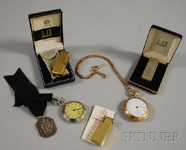 Group of Pocket Watches and Lighters, an open face: Group of Pocket Watches and Lighters, an open face Waltham pocket watch with chain, a Bristol pocket watch, two Dunhill lighters in original boxes, and an additional lighter.