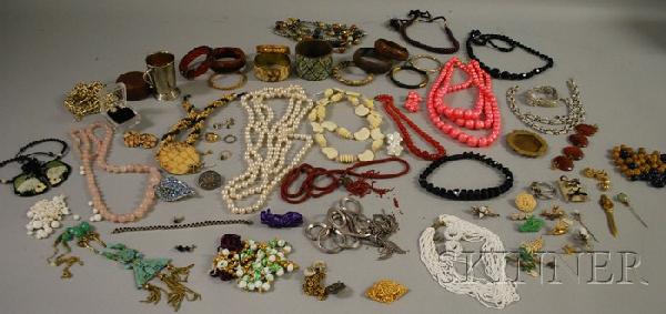 Large Group of Costume Jewelry, including several : Large Group of Costume Jewelry, including several paste and rhinestone pieces, beaded necklaces, bangle bracelets, and other items.