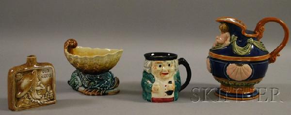 Four Assorted Majolica Glazed Ceramic Items, a Gu: Four Assorted Majolica Glazed Ceramic Items, a Gustavsberg footed seashell-form compote, a Shorter toby jug, an "Old Scotch" flask, and a footed jug.