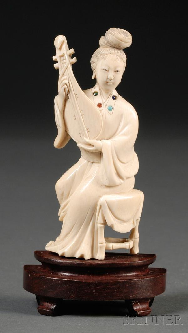 Ivory Carving, China, figure of a finely-attired l: Ivory Carving, China, figure of a finely-attired lady seated on a low bamboo stool while playing pipa, with lapis lazuli, turquoise, and other semiprecious stone inlay along her collar, wood stand, ht