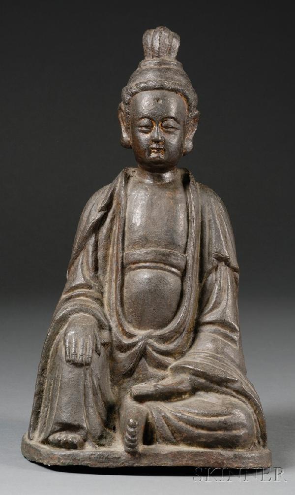 Gilt-bronze Sculpture, China, Wanli period (1563-1: Gilt-bronze Sculpture, China, Wanli period (1563-1620), seated figure of Guanyin, with traces of gilt to the body, carved characters in Chinese to the back, which reads "Wuxu nian jiazi yue shisi ri, 
