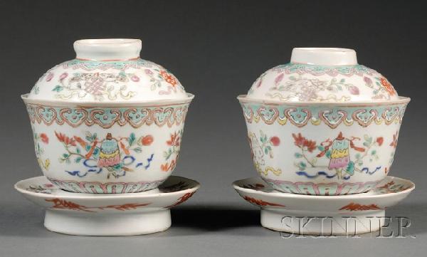 Pair of Cups with Stands and Saucers, China, the : Pair of Cups with Stands and Saucers, China, the exterior of each cup decorated in overglaze enamels of the Eight Buddhist Treasures, two tied together into a beribboned pair, the cup stand, and the s