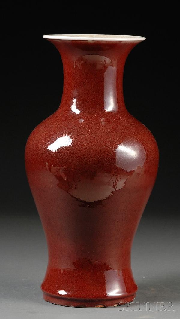 Sang-de-Boeuf Vase, China, 18th century, baluster: Sang-de-Boeuf Vase, China, 18th century, baluster form with crackle glaze, the interior and the base (except the unglazed foot ring) covered by celadon glaze with crackles, ht. 16 in. Provenance: Desc