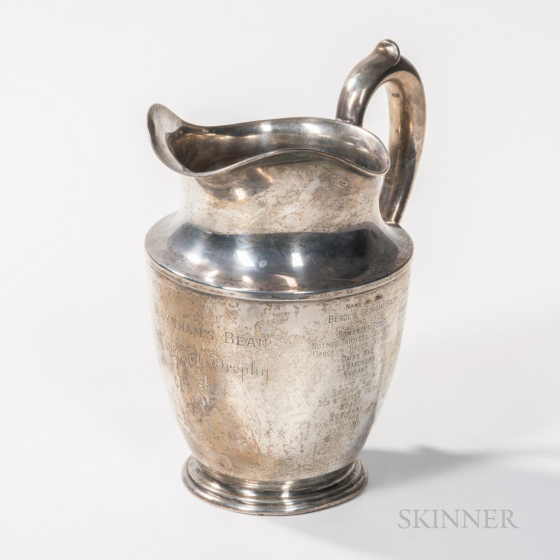 Wallace Silversmiths Sterling Silver Trophy Pitcher,: Wallace Silversmiths Sterling Silver Trophy Pitcher, Wallingford, Connecticut, mid-20th century, inscribed "Raynham's Beau Memorial Trophy Puppy" to the front; a list of names of the winning dogs and