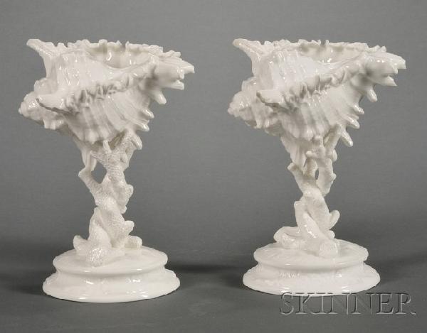 Two Wedgwood Bone China Shell Ornaments, England,: Two Wedgwood Bone China Shell Ornaments, England, c. 1895, each white glazed and similarly modeled with a shell supported on branches of coral, printed marks, ht. 7 in.