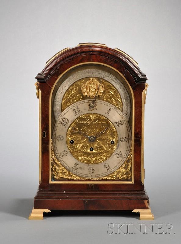 George III Mahogany and Ormolu Musical Bracket Clo: George III Mahogany and Ormolu Musical Bracket Clock, with antique elements, the dial and movement engraved for Eardley Norton, the triple drum fusee movement with nest of ten musical bells, with two